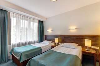 Отель Hotel Beskid Новы-Сонч Улучшенный двухместный номер с 1 кроватью или 2 отдельными кроватями-11